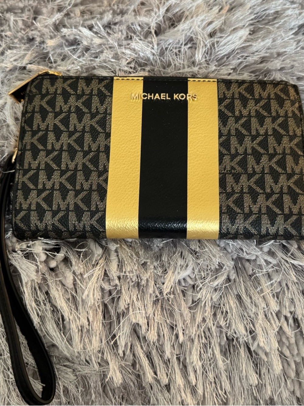 Michael Kors Brown Monogram Wristlet with Gold and Black Stripes
